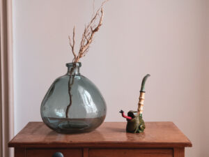 Frog pipe with bamboo, in a still life photo