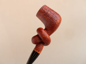 Knotted pipe made of sandblasted briar and ebonite.Handmade by Arcangelo Ambrosi