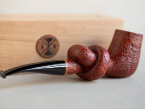 Knotted pipe made of sandblasted briar and ebonite. With box. Handmade by Arcangelo Ambrosi